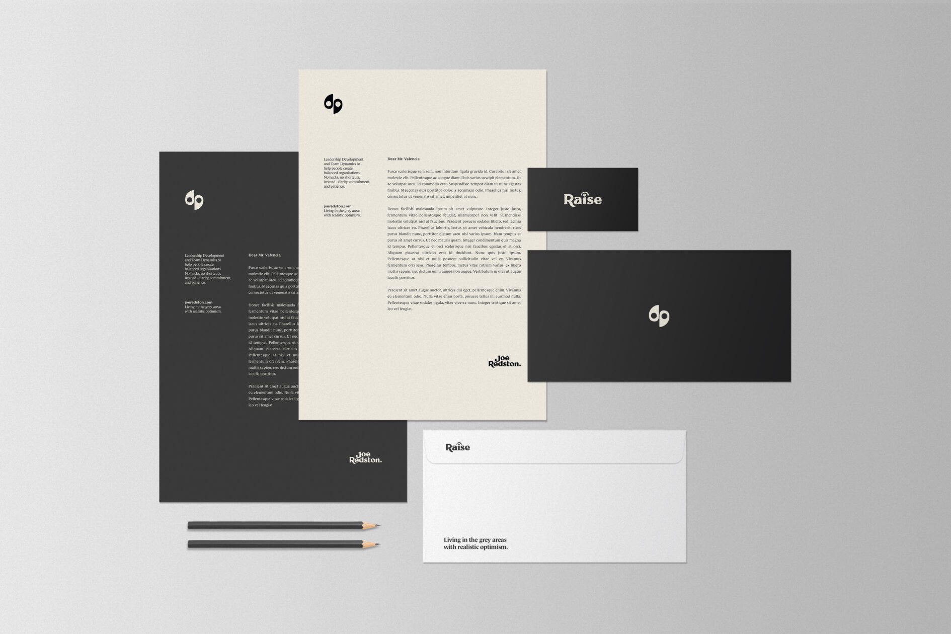 Full stationery suite showcasing the Raise Global and Joe Redston identities, designed to express clarity, confidence, and thoughtful separation between personal and business branding.