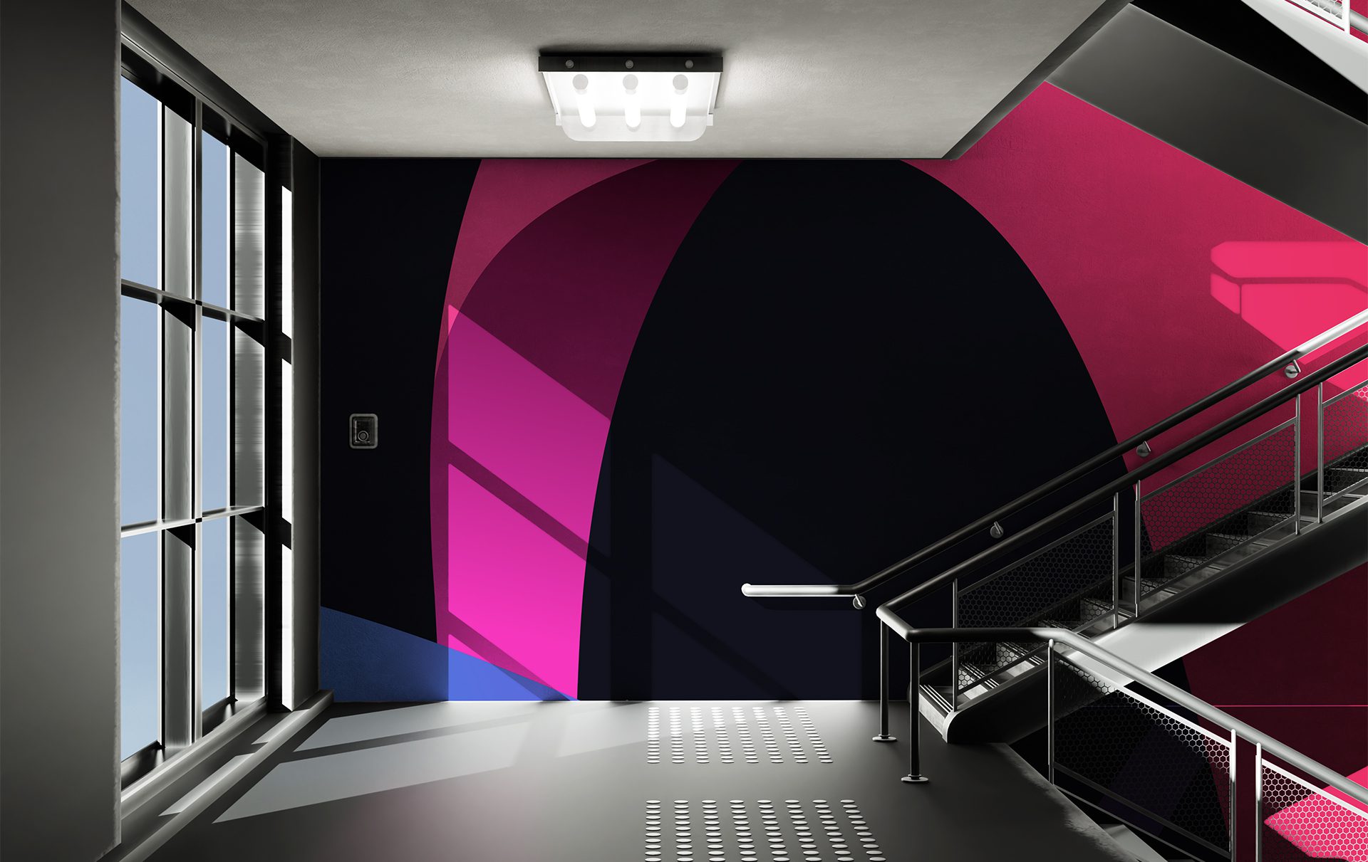 Diagonal branded mural inside WRS headquarters stairwell, featuring bold colours and angled shapes that reflect the company’s visual identity.