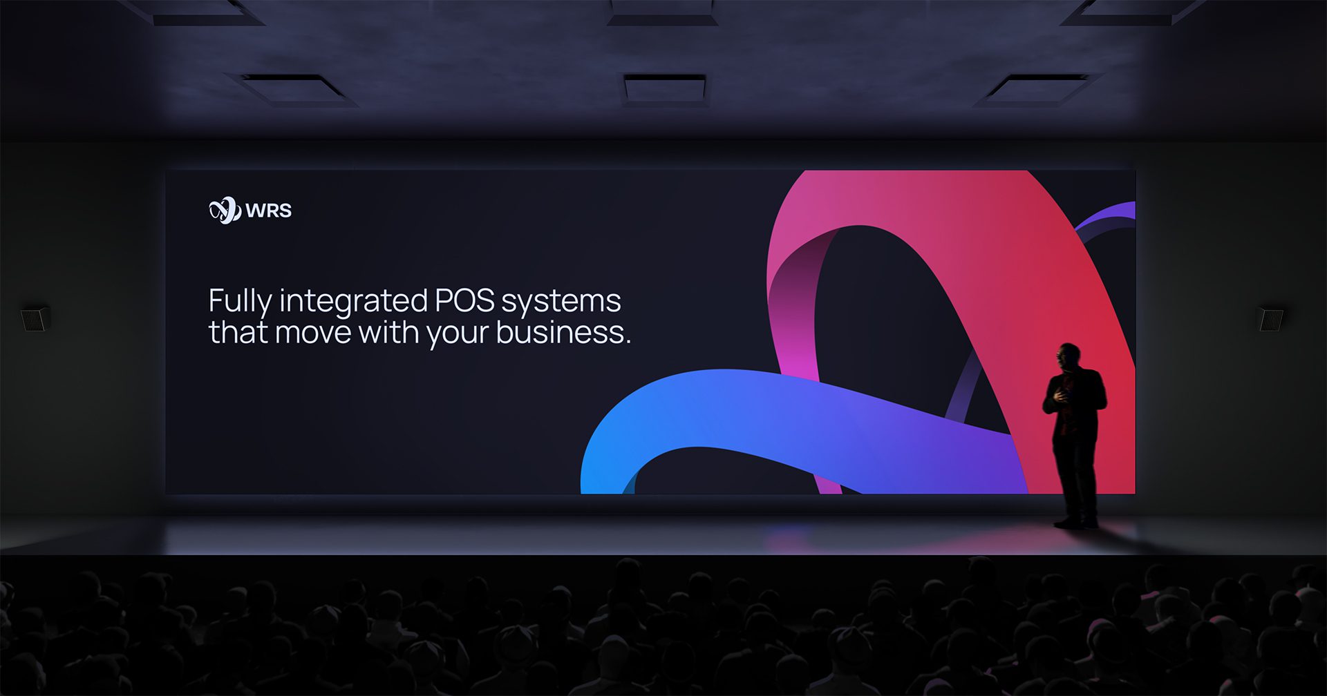 WRS expo stage with large screen displaying brand messaging: “Fully integrated POS systems that move with your business,” set against abstract red and blue ribbon shapes.